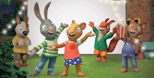 A group of cartoon characters stand in front of a white projector screen in a garden with fairy lights