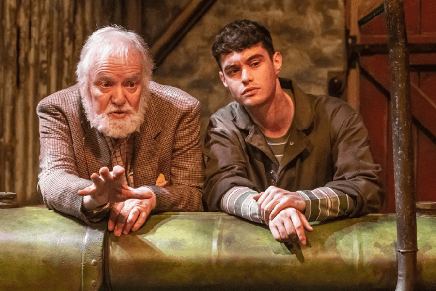 An elderly man and young man in a close up