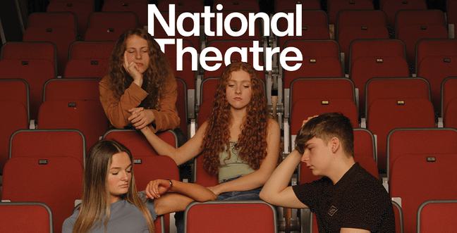 National Theatre. A group of teenagers sit in theatre seats looking sad