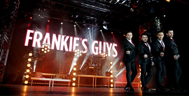 Four men on stage in front of a title, 'Frankie's Guys'