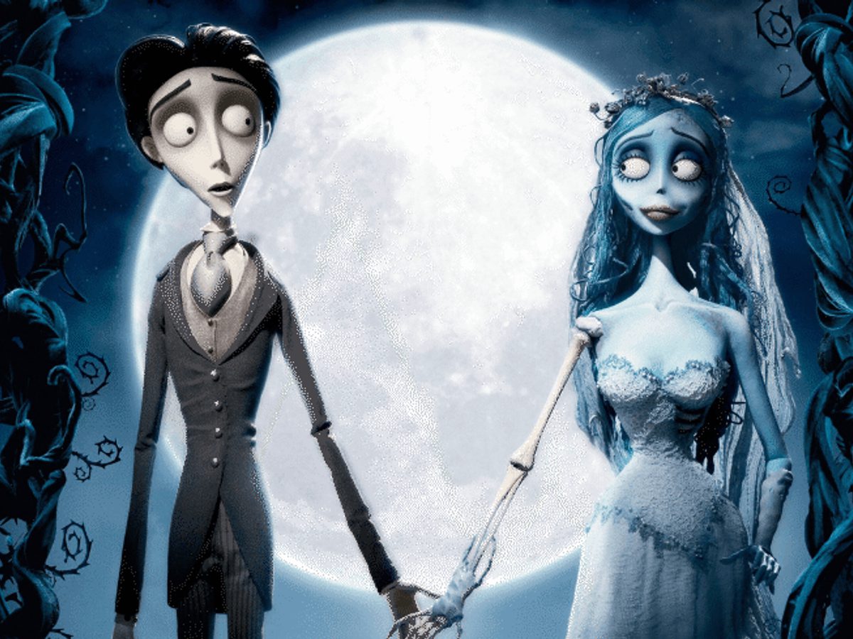 A cartoon man and woman stand at the wedding altar in front of a large blue moon