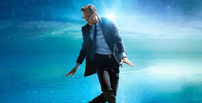 A man in a suit and tie gracefully balances as if walking on water, with a glowing sky and ocean-like background behind him.