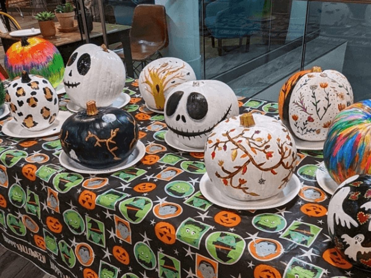 hand painted pumpkins in a range of halloween style designs like skulls, ghosts etc.