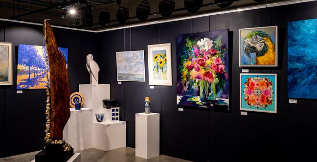 A gallery containing both sculptures and paintings